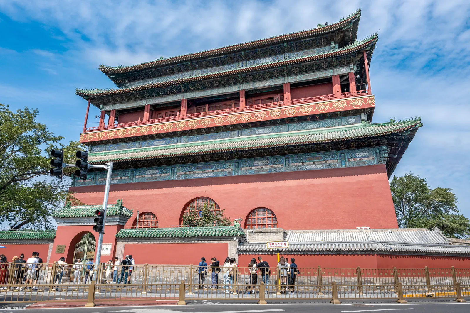 The red-walled Drum Tower of Beijing under a blue sky