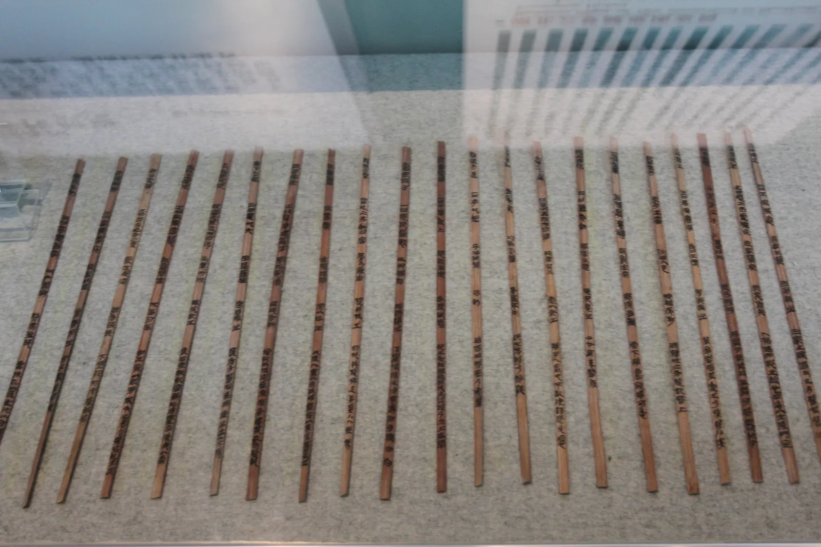 Rows of inscribed Three Kingdoms bamboo slips on display at the Bamboo Slips Museum