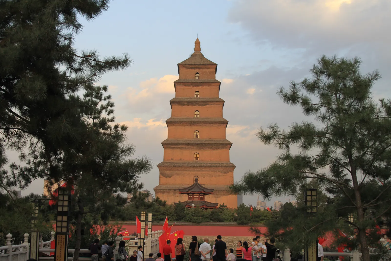 The Big Wild Goose Pagoda framed by pine trees in evening light