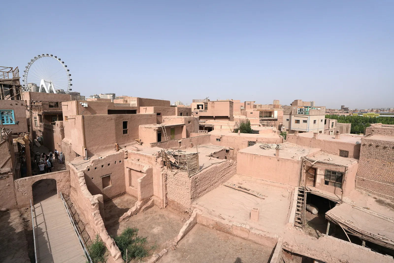 Mud-brick rooftops and lanes of the Gaotai old residences on their loess cliff