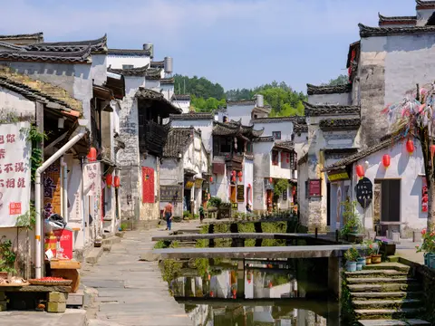 White-walled Hui-style houses along the stream in Likeng village, Wuyuan