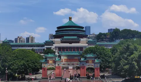 Domed Great Hall of the People in Chongqing under a blue sky