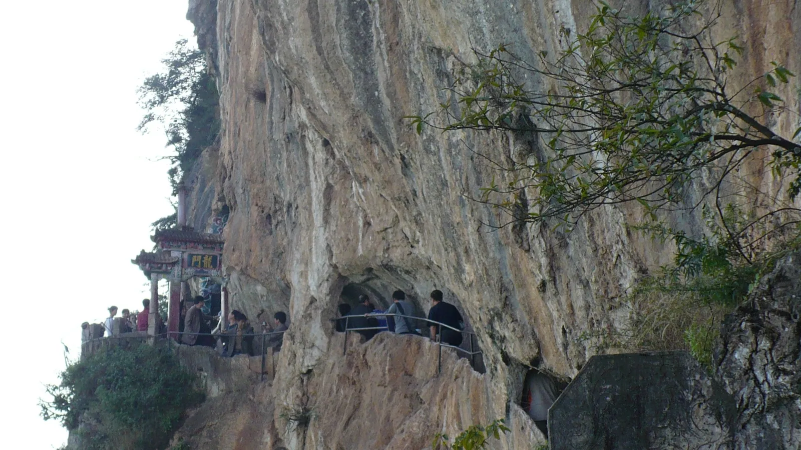 The Dragon Gate path carved into the sheer cliff of the Western Hills
