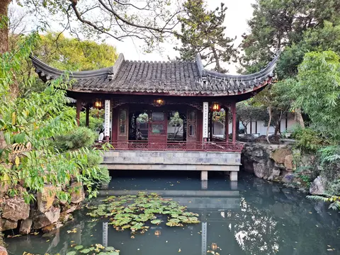Pavilion over a lily pond in the Couple’s Retreat Garden