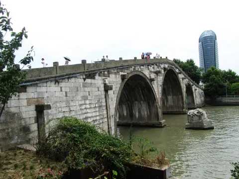Gongchen Bridge’s three stone arches spanning the Grand Canal in Hangzhou
