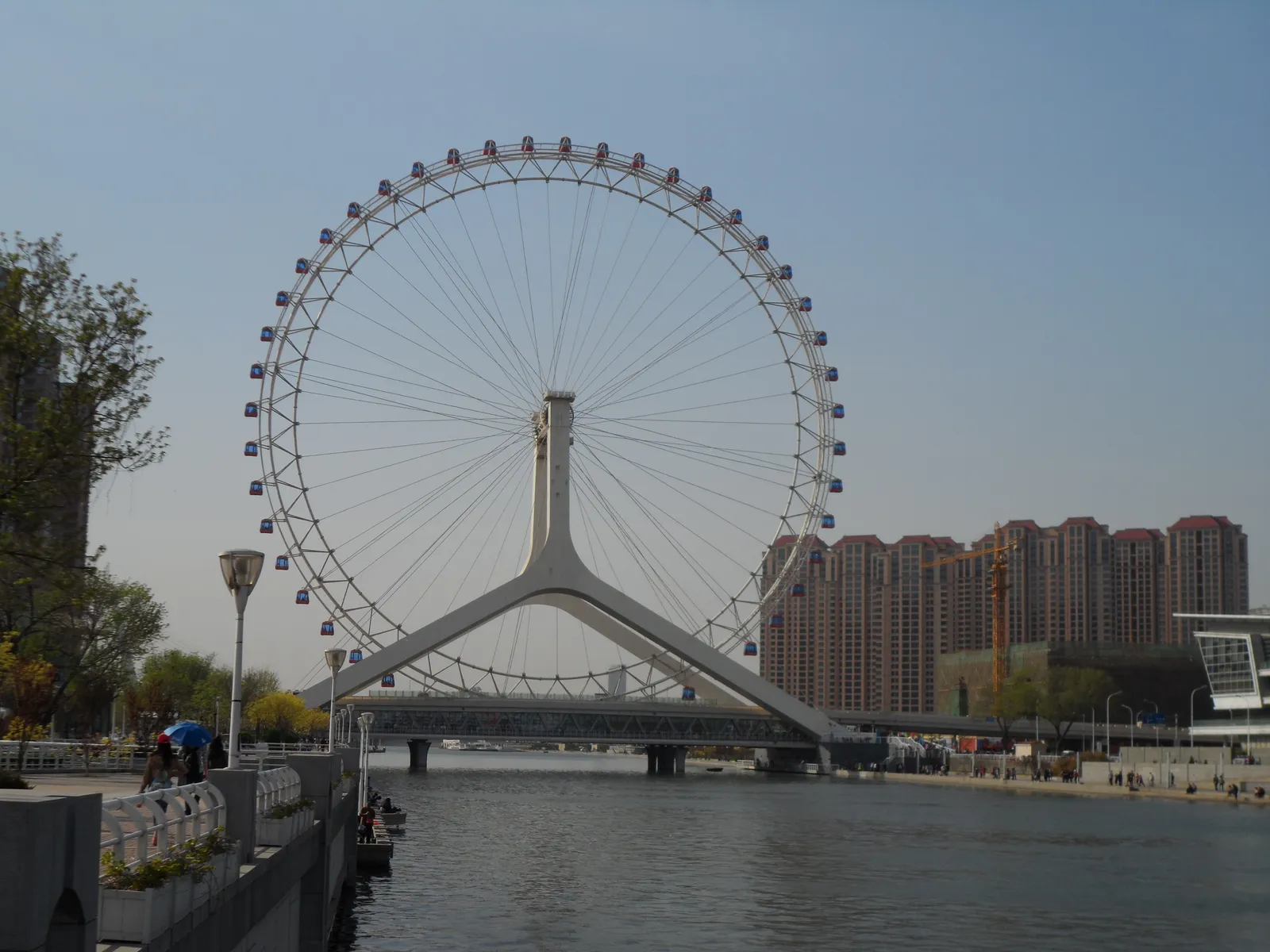 The Tianjin Eye Ferris wheel on Yongle Bridge over the Haihe