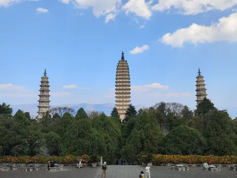 The Three Pagodas of Chongsheng Temple under a blue sky