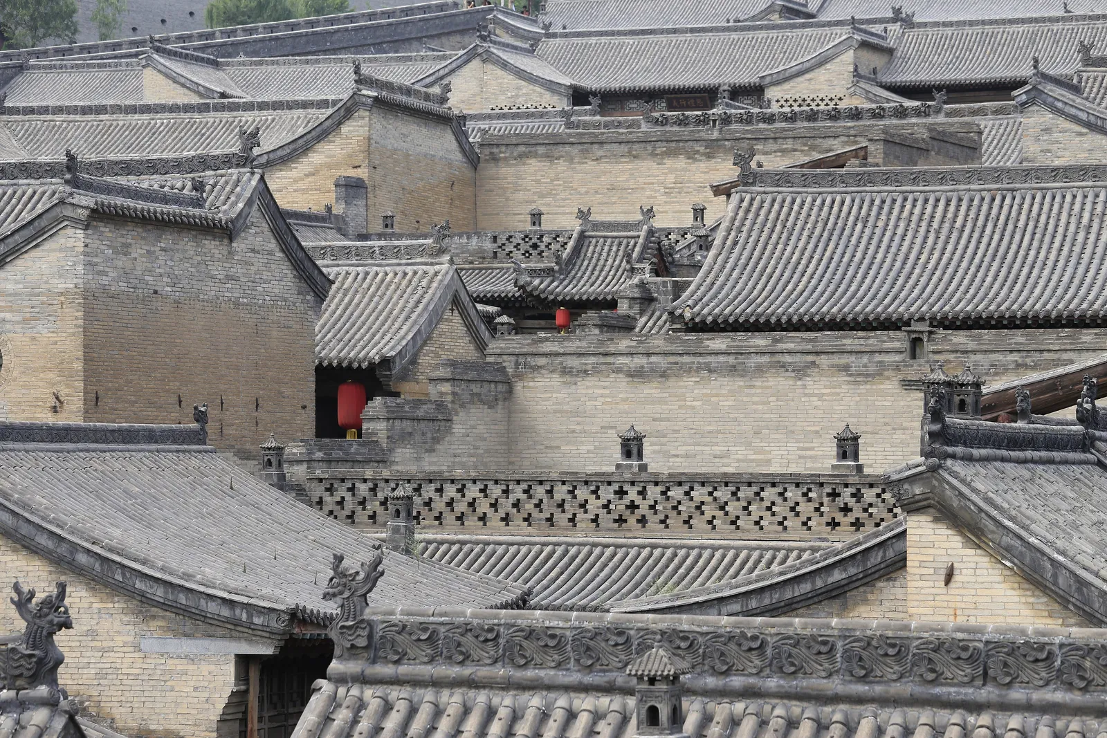Grey-tiled rooftops of the Hongmenbao compound at the Wang Family Courtyard