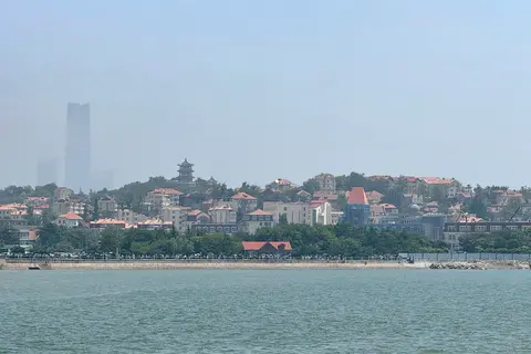 Xiaoyushan hill and its pavilion seen across the bay