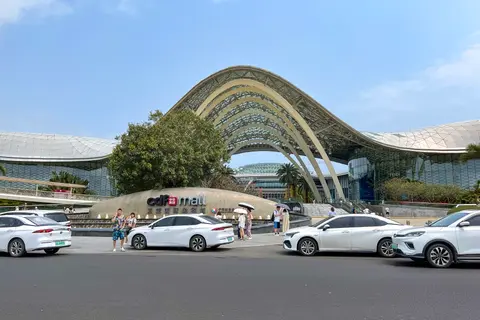 The arched facade of the CDF duty-free mall at Haitang Bay
