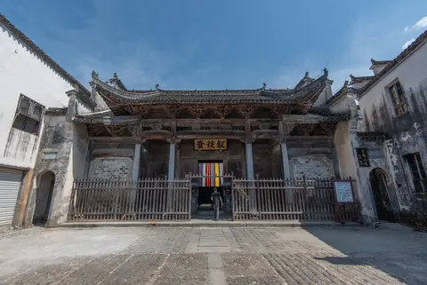 Carved Huizhou-style ancestral hall facing a square in Nanping village