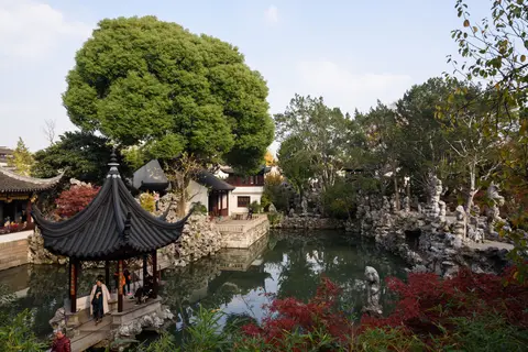 Pond, pavilion and limestone rockeries in Lion Grove Garden