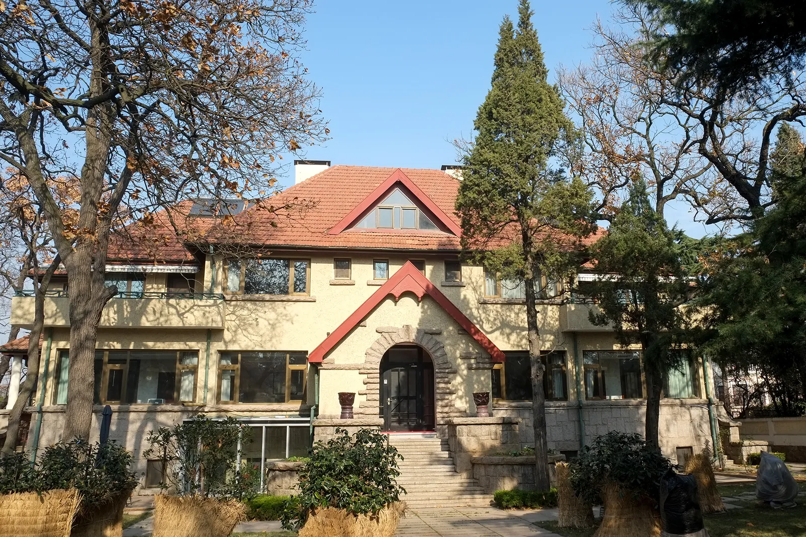 A historic European-style villa among trees in Badaguan