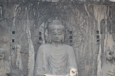 The giant Vairocana Buddha at Fengxian Temple, Longmen Grottoes