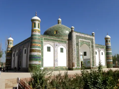 Green-tiled dome and minarets of the Apak Khoja Mausoleum