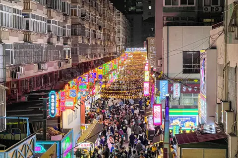 Neon-lit Zier Street night market in Qingdao's Taidong district