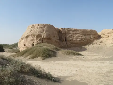 Eroded rammed-earth walls of the Suoyang City ruins in the Gobi