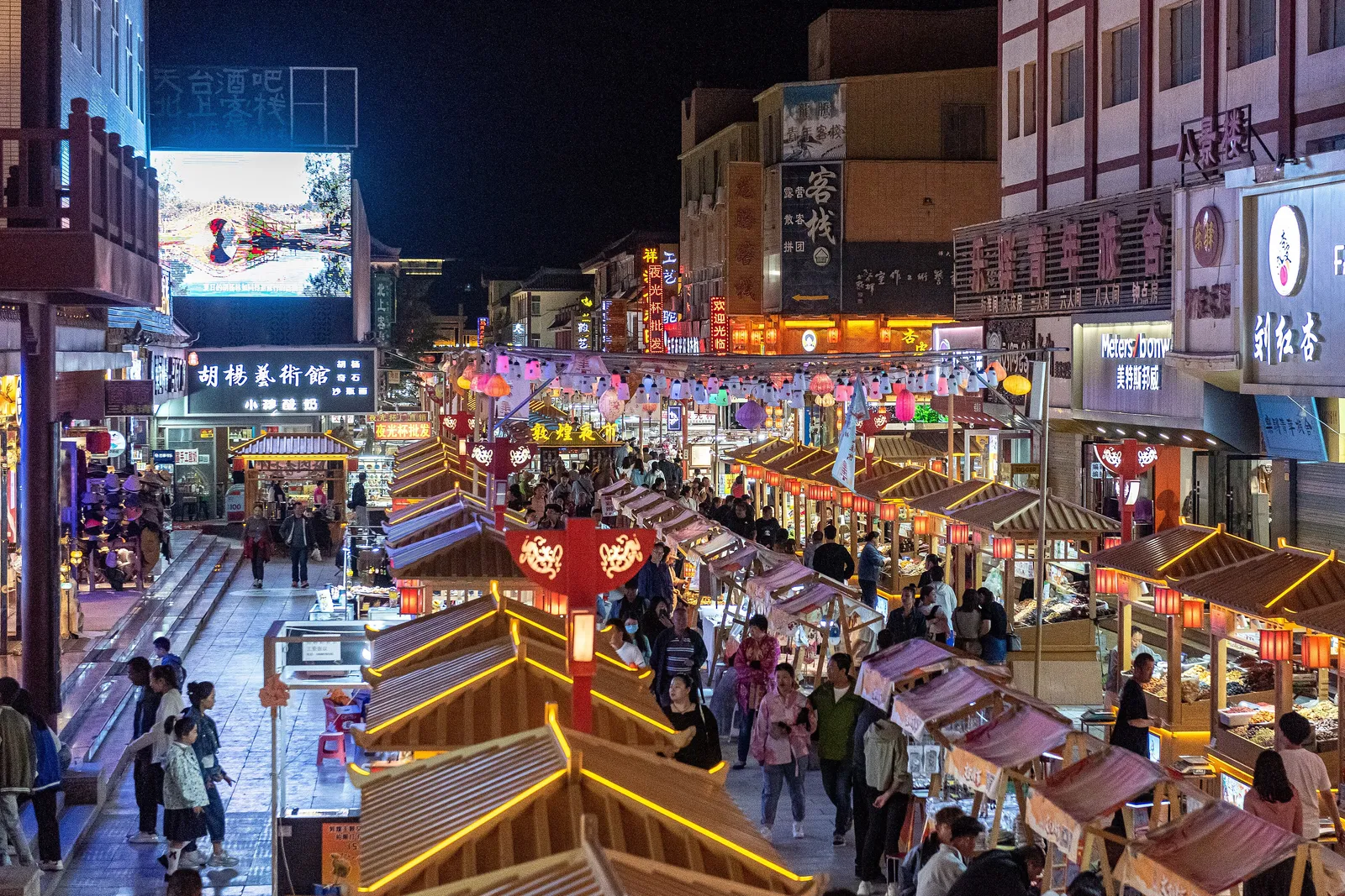 Lantern-lit stalls of Dunhuang’s Shazhou Night Market