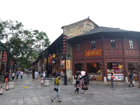 Restored old shopfronts and a pedestrian lane in Kunming Old Street
