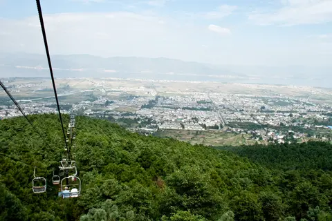 Chairlift climbing Cangshan Mountain above the Dali plain