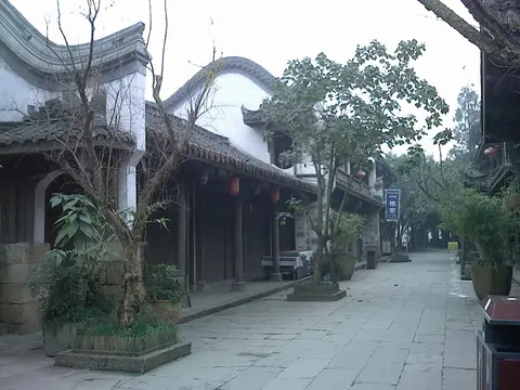 An old street lined with traditional houses in Huanglongxi Ancient Town