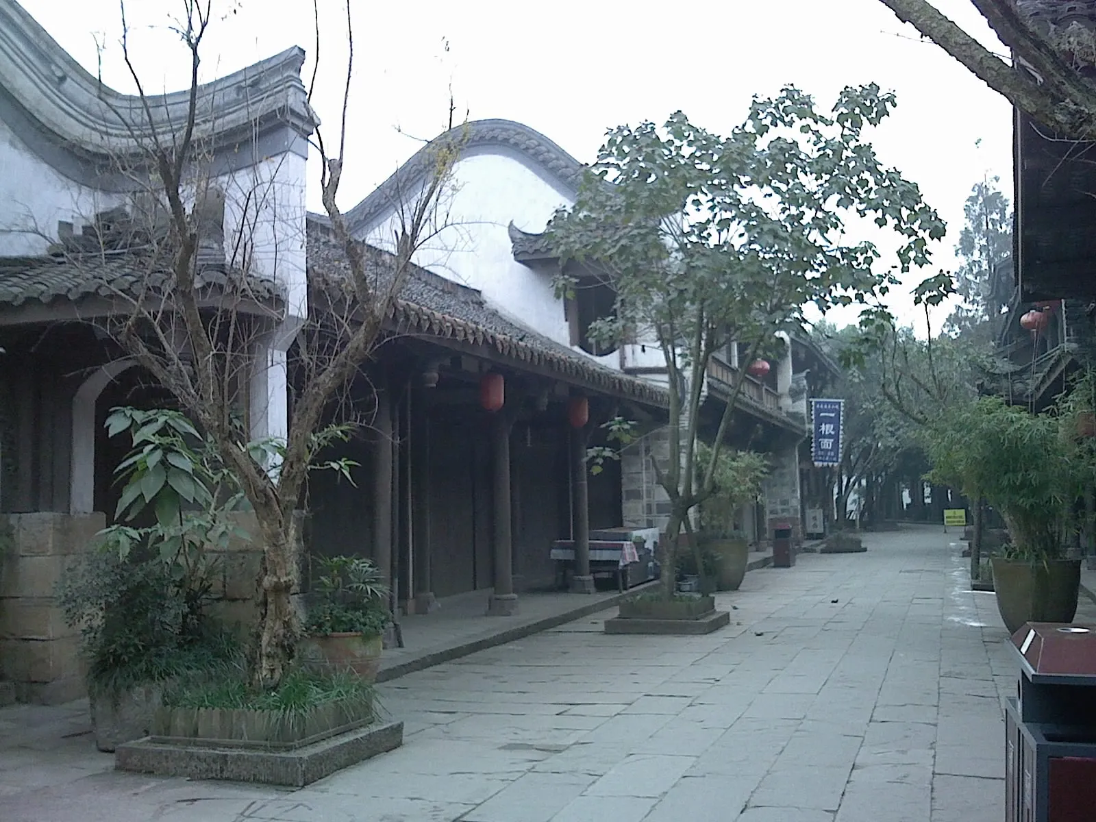 An old street lined with traditional houses in Huanglongxi Ancient Town