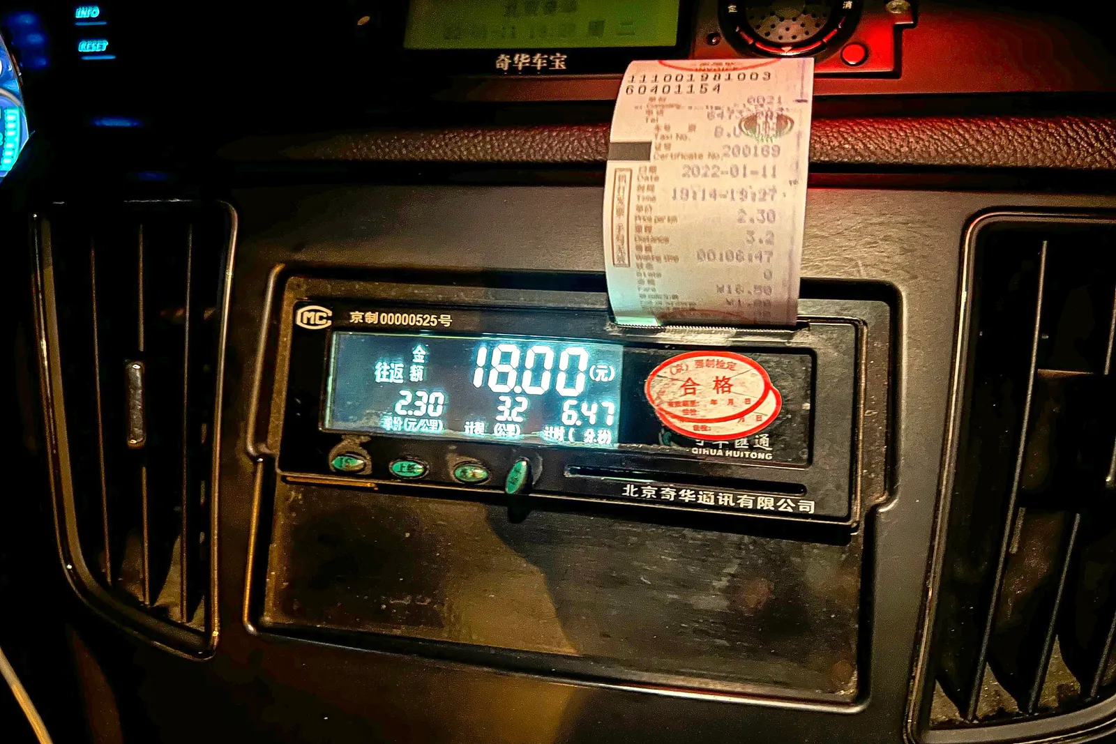 Pekinger Taxameter mit 18 Yuan Fahrpreis und Quittung