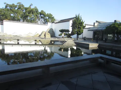 Reflecting pool and stone-slice rockery wall at the Suzhou Museum