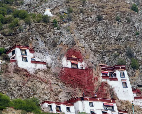 Hermitage buildings clinging to the cliffs at Drak Yerpa