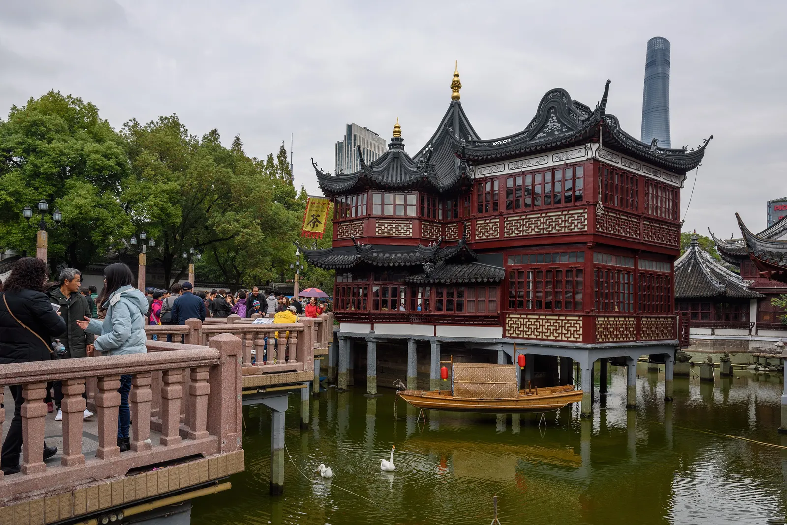 Huxinting Teahouse and its zigzag bridge over the pond at Yu Garden