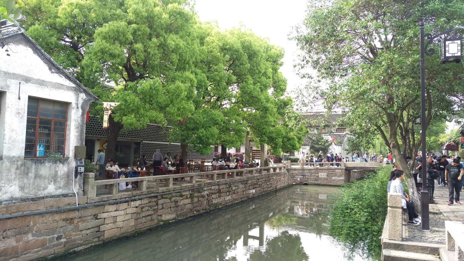Canal and tree-shaded old houses along Pingjiang Road