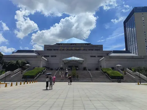 The Wuhan Museum building in Hankou under a summer sky