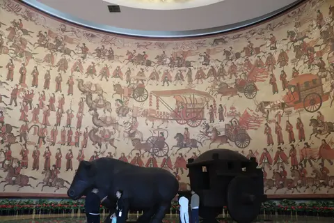 Northern Wei procession mural and ox-cart model in the Datong Museum hall