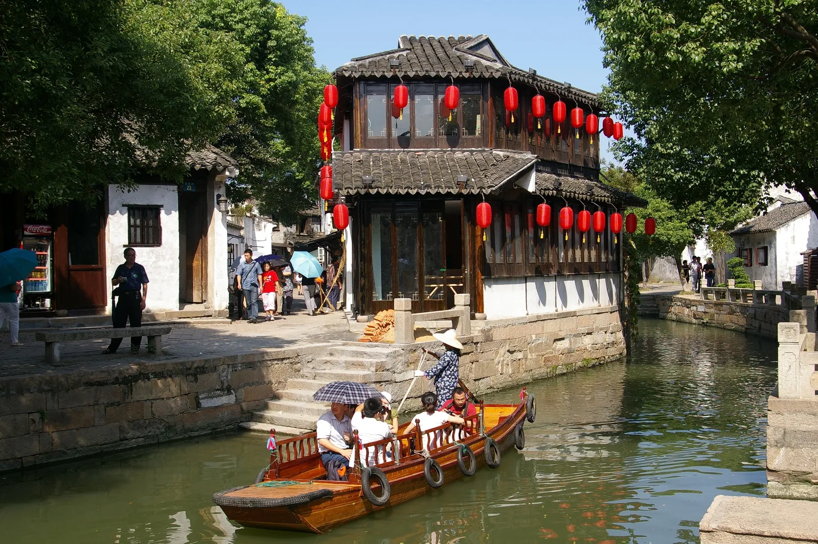 Lantern-hung waterfront house and canal boat in Tongli