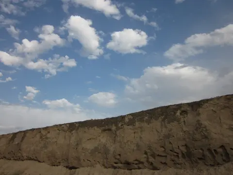 Weathered rammed-earth Ming Great Wall north of Shandan town