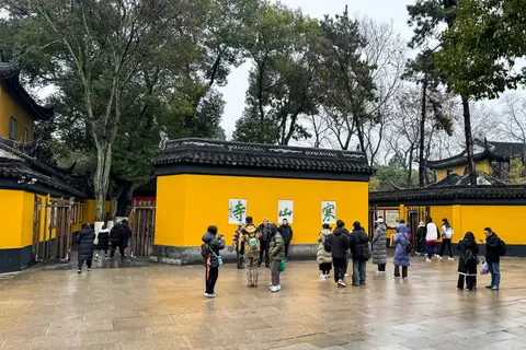 Ochre-yellow walls and courtyard of Hanshan Temple