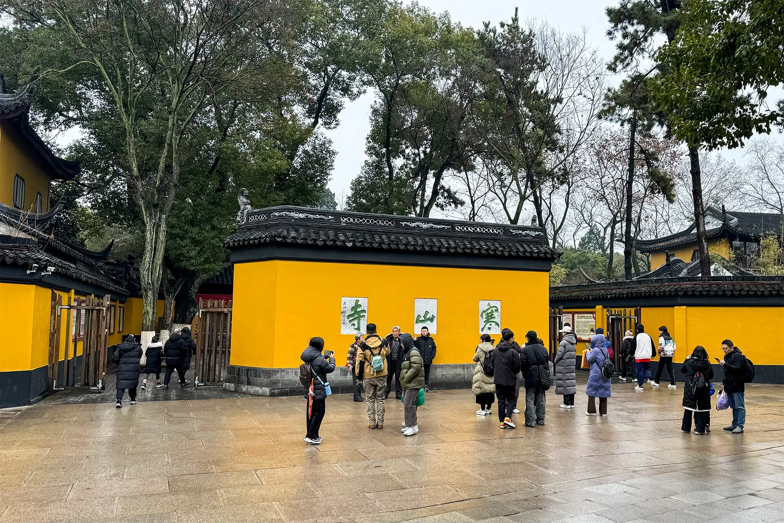 Ochre-yellow walls and courtyard of Hanshan Temple