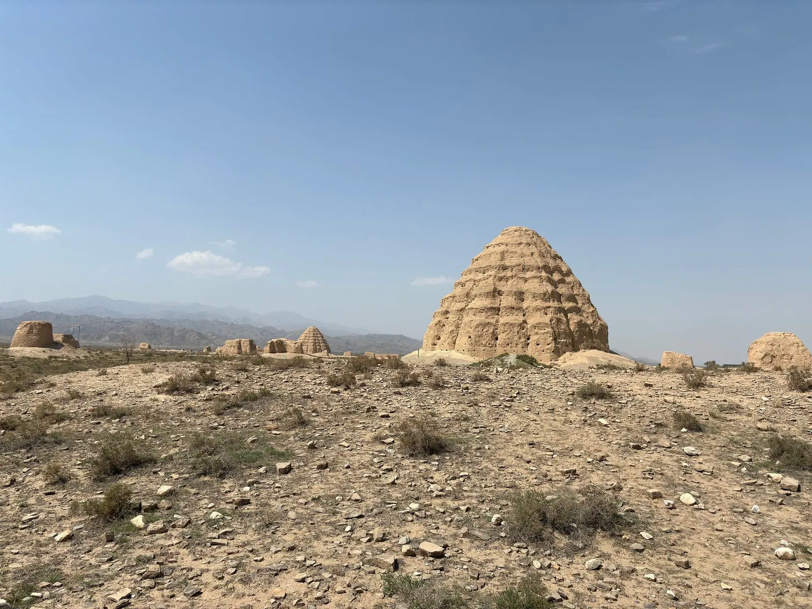 Earthen burial mound of the Western Xia Imperial Tombs with the Helan Mountains behind, Yinchuan
